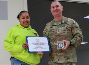 Maj. Gen. James W. Ring, the Adjutant General of Virginia, presents awards to three Virginia Department of Military Affairs employees for their service to DMA Dec. 2, 2024, at the State Military Reservation in Virginia Beach, Virginia.