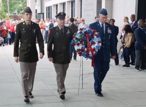 Maj. Gen. James W. Ring, Chief Master Sgt. John F. Nye and Spc. Nicholas Warren place a memorial wreath to honor the fallen during the Commonwealth’s Memorial Day Ceremony May 26, 2025, in Richmond, Virginia.