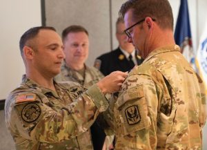 Virginia National Guard and Chesterfield Fire and Emergency Medical Services senior leaders present the VNG Bronze Star to members of the Virginia Helicopter Aquatic Rescue Team April 22, 2025, in Chesterfield, Virginia.