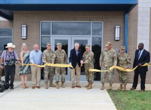 Virginia National Guard senior leaders along with state and local government officials cut a ribbon to formally open the expanded Roanoke Regional Readiness Center Aug. 2, 2025, in Troutville, Virginia.
