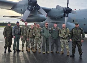 Virginia National Guard Airmen pose for a photo as they observe Protective Fence 2025, an agile combat readiness exercise conducted by the Finnish Air Force Sept. 22-26, 2025, in Finland.